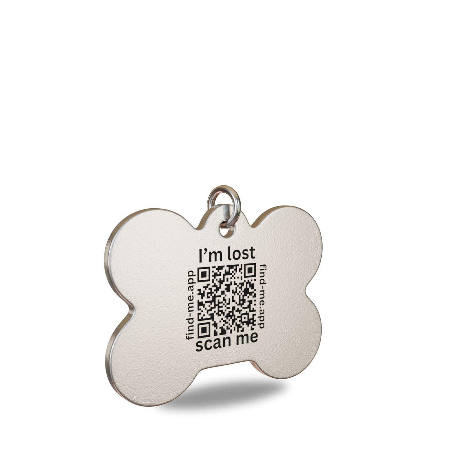 “40mm x 30mm Bone shaped high grade stainless steel Find Me pet ID tag engraved with a unique QR Code and text saying I'm lost : Scan Me. Attached to a matching stainless split ring to prevent corrosion.”